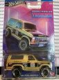 1:64 Ford Bronco, 1985, sort&guld, HRR97, Hot Wheels, Tubular Trucks